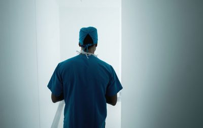 Doctor walking away Getty Images 692381688