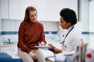 Female patient and female doctor Getty Images 1461330630