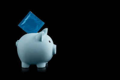 Piggy bank with condom Getty Images 1453941209