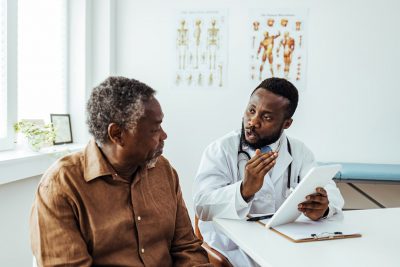 Doctor explaining to patient Getty Images 1412634309