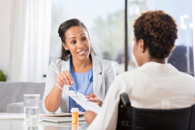 Doctor discussing instructions with patient Getty Images 865900266