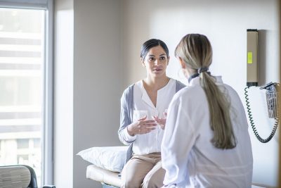 Female patient with doctor Getty Images 1293534290