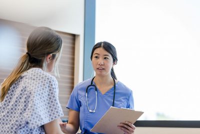 Female patient with nurse Getty Images 1407170546