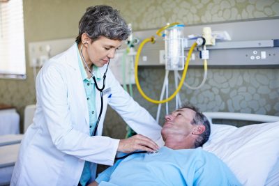 Physician examining patient Getty Images 479965018