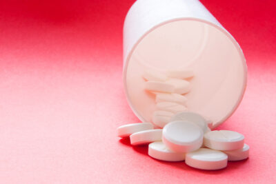 Tablets on red background Getty Images 1157732695