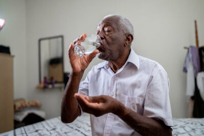 Older man taking medication Getty Images 1496145218