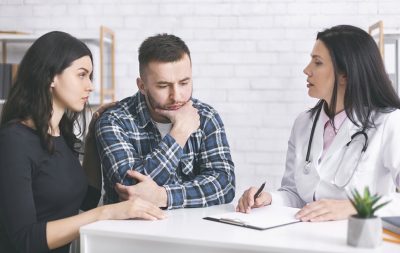 Couple with OBGYN Getty Images 1178917934